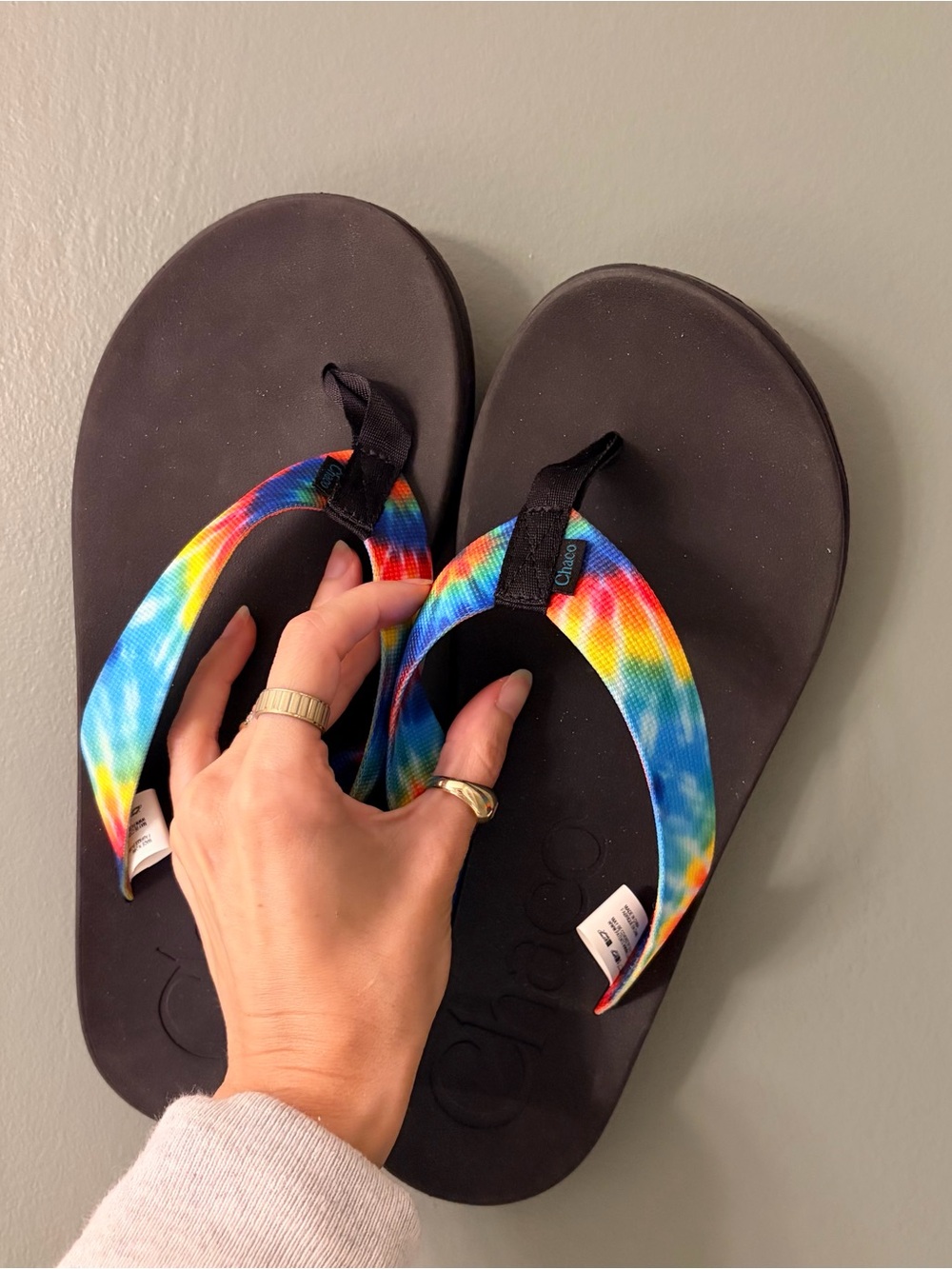 Chacos Women's Flip Flops with Rainbow Tie-Dye Straps and Black Footbed